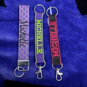 Personalized Keychain Set with Purple, Green, and Black Designs